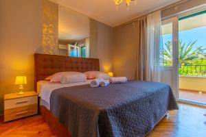 Postel nebo postele na pokoji v ubytování Villa Lean