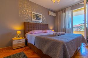 Postel nebo postele na pokoji v ubytování Villa Lean