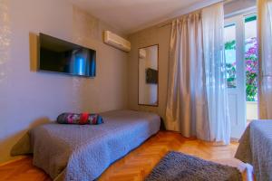 Postel nebo postele na pokoji v ubytování Villa Lean