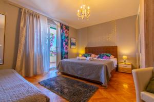 Postel nebo postele na pokoji v ubytování Villa Lean