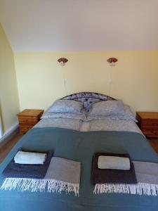 Posteľ alebo postele v izbe v ubytovaní Mókus Apartman
