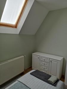 Posteľ alebo postele v izbe v ubytovaní Mókus Apartman