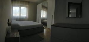 Ένα ή περισσότερα κρεβάτια σε δωμάτιο στο Casa BRUMANA