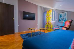 TV a/nebo společenská místnost v ubytování Villa Lean