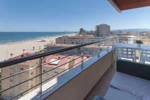 a balcony with a view of the beach at AG Aquarium in Playa de Gandia