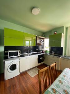 A kitchen or kitchenette at Stay the Night Shkodra Apartment City Centre