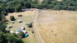 an aerial view of a field with a group of tents at Tent Pitch only no accommodation supplied in Elsenham