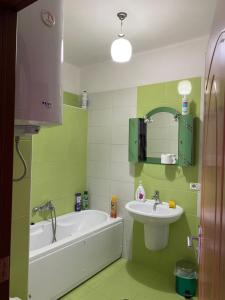 A bathroom at Stay the Night Shkodra Apartment City Centre