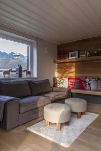 Posedenie v ubytovaní Finest Ski Chalet Leogang by All in One Apartments