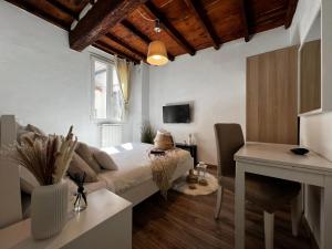 TV a/nebo společenská místnost v ubytování A casa di Anna