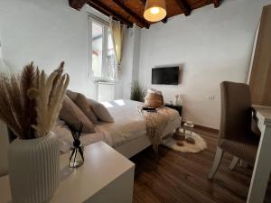 TV a/nebo společenská místnost v ubytování A casa di Anna + 45 fotografií