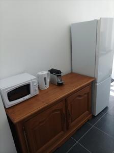 Kuchyňa alebo kuchynka v ubytovaní O'Couvent - Appartement 97 m2 - 4 chambres - A514
