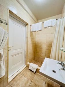 Koupelna v ubytování Sergeev Hotel