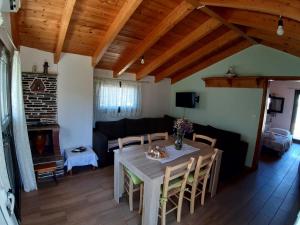 A television and/or entertainment centre at Traditional house in Akamatra square