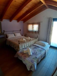 A bed or beds in a room at Traditional house in Akamatra square