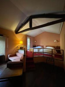 Кровать или кровати в номере Hotel Gattapone