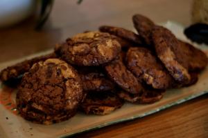 a pile of cookies on a plate on a table at Le Rose Thé in La Ciotat