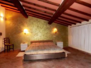 Postel nebo postele na pokoji v ubytování Country House La Fattoria Bellandi