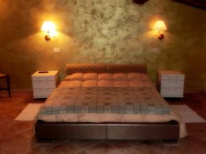 Postel nebo postele na pokoji v ubytování Country House La Fattoria Bellandi