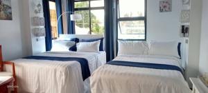 Postel nebo postele na pokoji v ubytování Gmb-Arte' Hotel