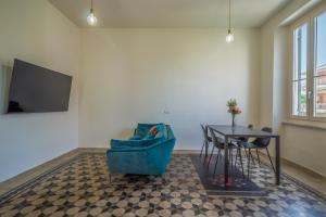 Televízia a/alebo spoločenská miestnosť v ubytovaní CASA MATI Relax e stile vicino alle Cinque Terre