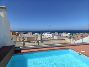 The swimming pool at or close to África View