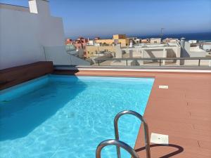 The swimming pool at or close to África View