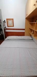 Ein Bett oder Betten in einem Zimmer der Unterkunft Mary's Rooms Low Cost