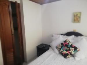 Habitaciones en Edificio Ginebra Manizales客房内的一张或多张床位