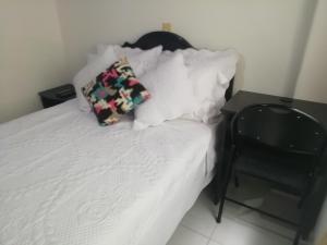 Habitaciones en Edificio Ginebra Manizales客房内的一张或多张床位