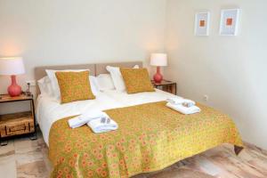 A bed or beds in a room at vituco34
