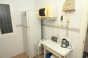 Kuchyňa alebo kuchynka v ubytovaní Habitación en el corazón del centro de Malaga