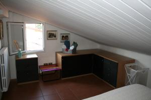 Posteľ alebo postele v izbe v ubytovaní Alloggio Incantevole sui tetti di Bologna