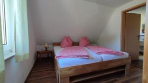Postel nebo postele na pokoji v ubytování Ferienhaus Rudolf
