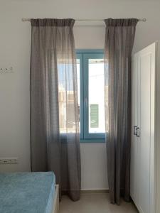 Postel nebo postele na pokoji v ubytování Ad Astra Residence