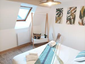 Voodi või voodid majutusasutuse Centre - L'escapade toas