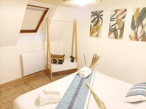 Voodi või voodid majutusasutuse Centre - L'escapade toas