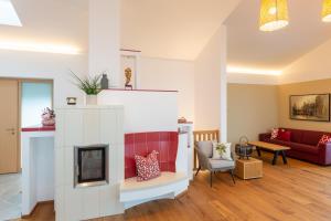 Posezení v ubytování Greim15 --- ganzes Ferienhaus mit Fernsicht, Pool, Wellness