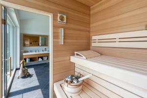 Postel nebo postele na pokoji v ubytování Greim15 --- ganzes Ferienhaus mit Fernsicht, Pool, Wellness