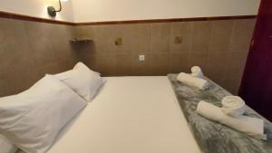 A bed or beds in a room at Sea Friendly Holiday Home