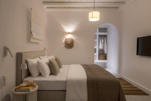 Posteľ alebo postele v izbe v ubytovaní Mykonos Esti Luxury Villas