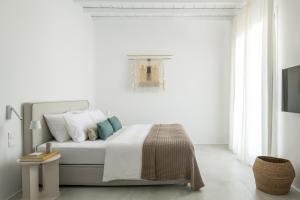 Posteľ alebo postele v izbe v ubytovaní Mykonos Esti Luxury Villas