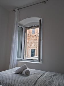 Posteľ alebo postele v izbe v ubytovaní Apartments Vlaho
