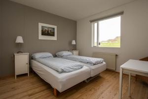 Postel nebo postele na pokoji v ubytování Móar guesthouse
