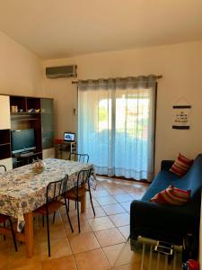 Ruang duduk di Sardegna Appartamento Posada