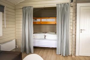Säng eller sängar i ett rum på Móar Cottage