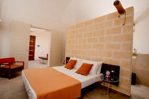 Łóżko lub łóżka w pokoju w obiekcie Setteminne Resort Design