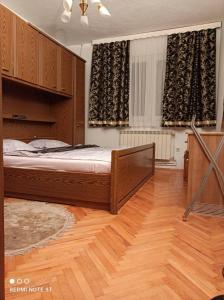 Säng eller sängar i ett rum på Apartment Tarik