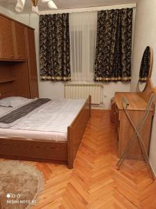 Ένα ή περισσότερα κρεβάτια σε δωμάτιο στο Apartment Tarik