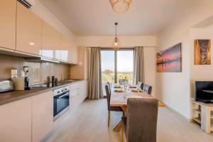 A kitchen or kitchenette at Villa Nikos Olivestone by Villa Plus